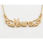 Gold necklace with 'Noura' written on it against a white background