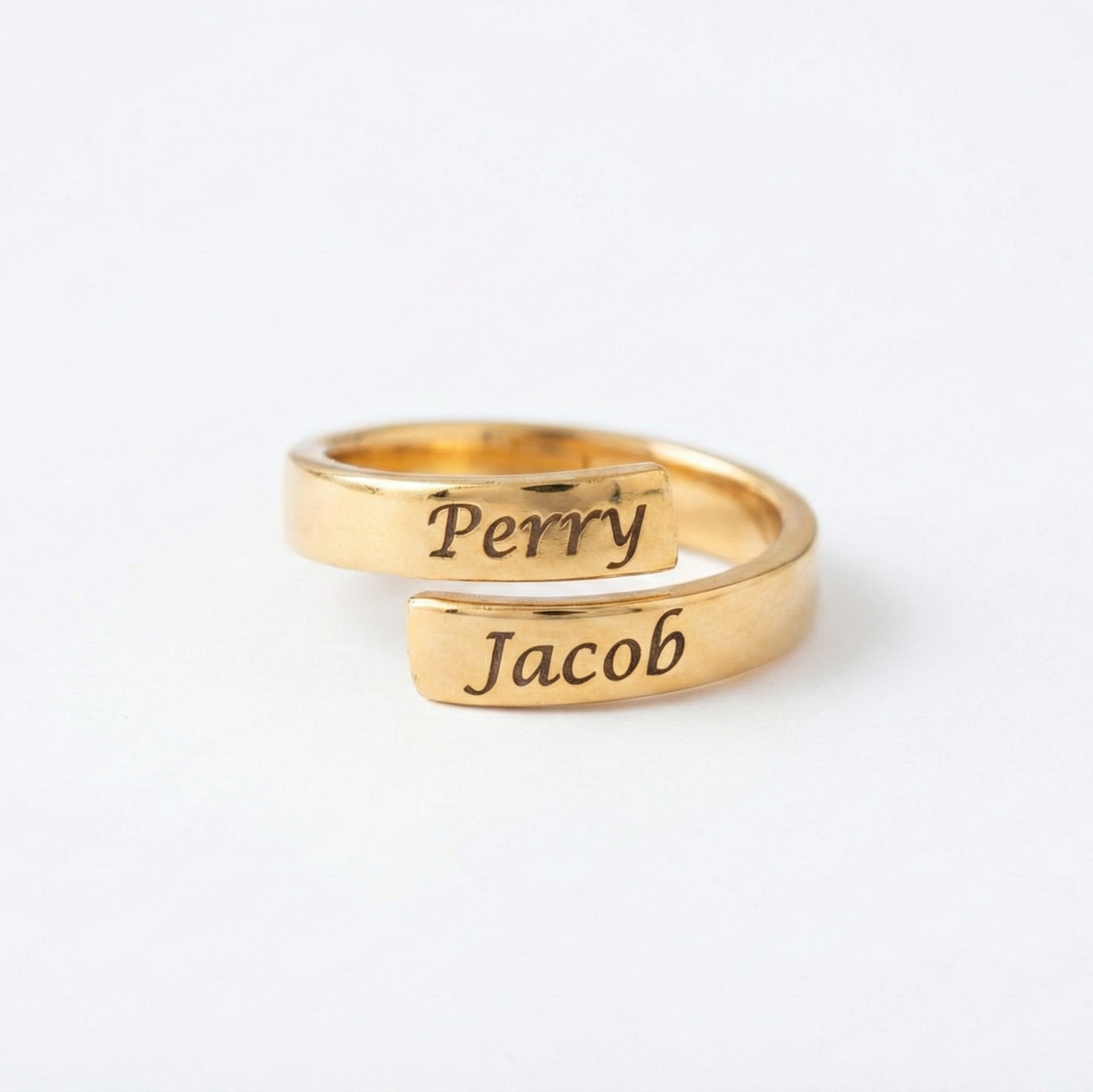 Two names engraved on a ring with white background