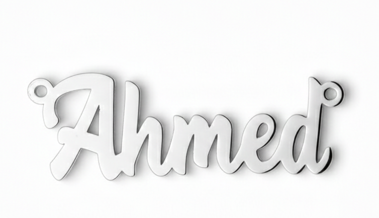 Silver pendant with 'Ahmed' engraved on a white background